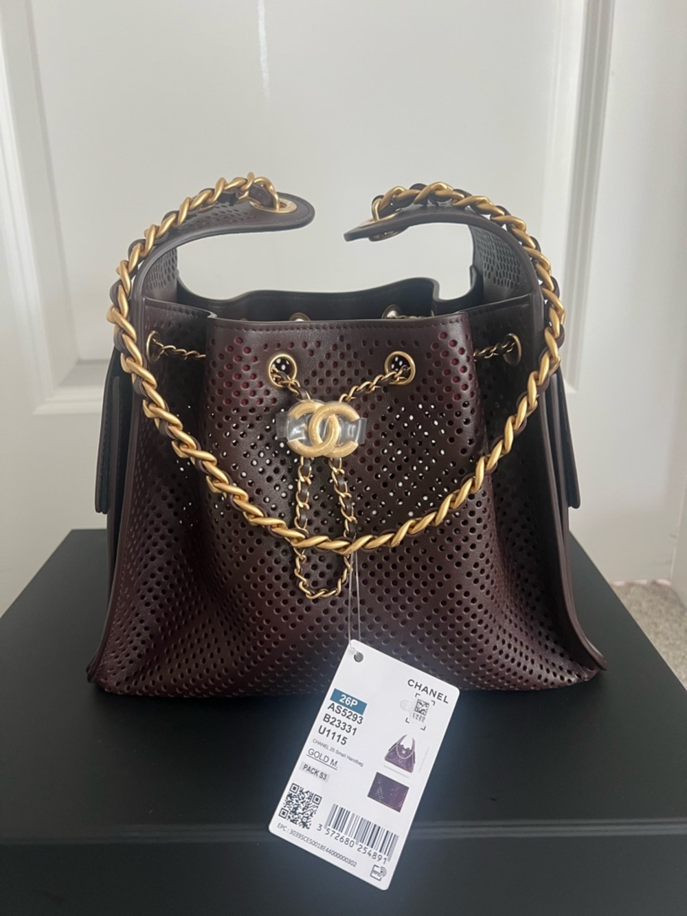 Chanel perforated dark brown 25 small 26s